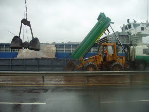 Ship being loaded with Contaminated Soil for Disposal